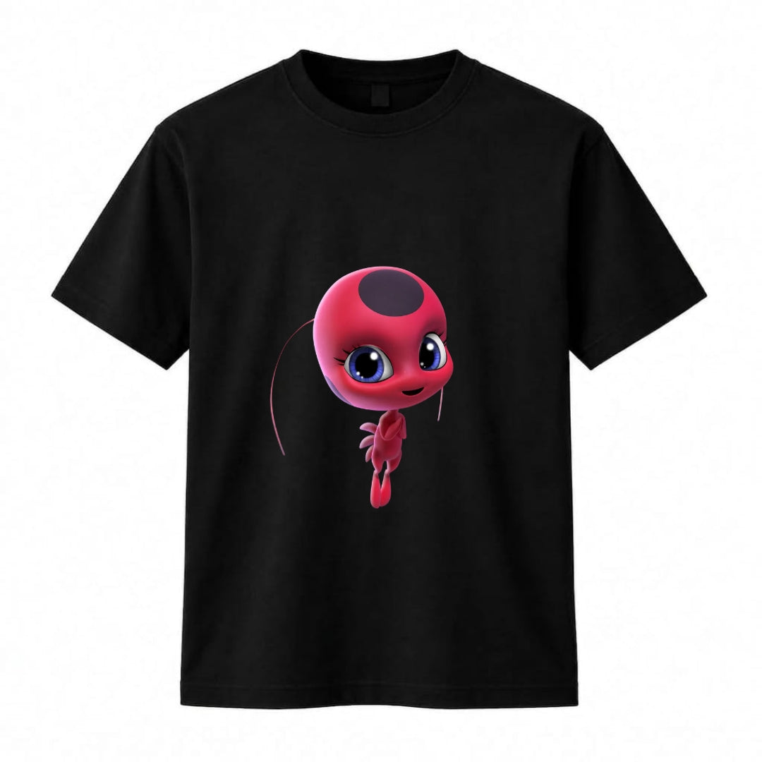 A classic black crewneck graphic t-shirt featuring Tikki, the Ladybug Kwami from Miraculous: Tales of Ladybug & Cat Noir.